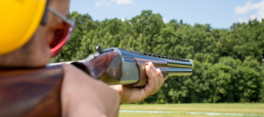 A man shoots skeet competitively using MGM targets